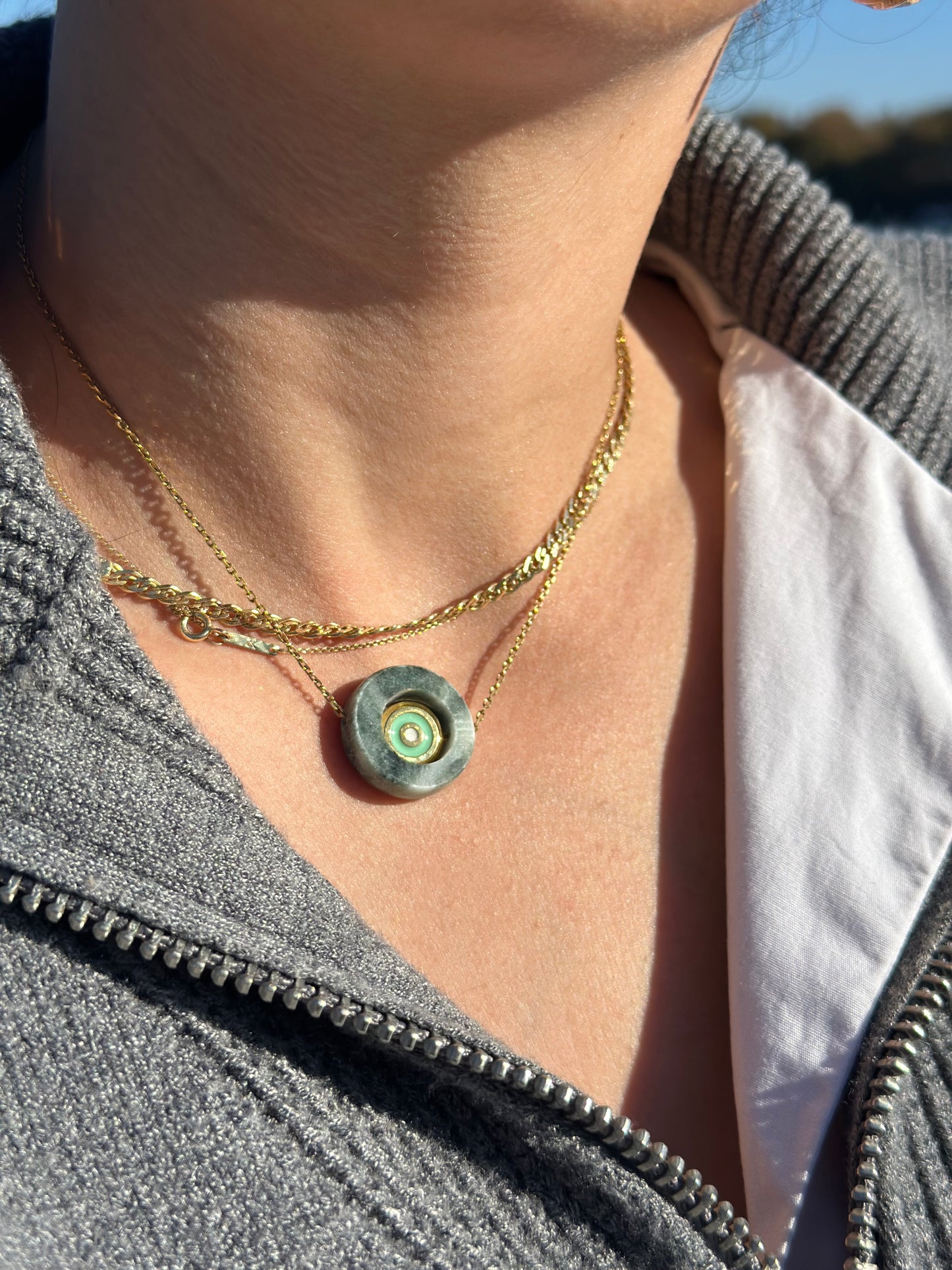 Circle made of green Tinos marble with an internal steel green eye