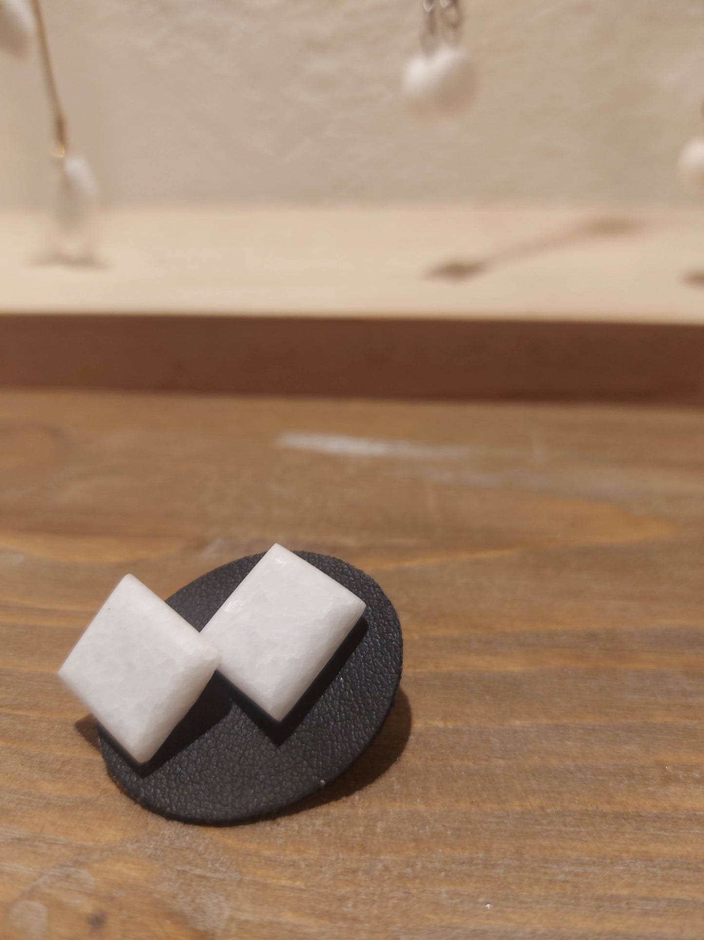 Square stud earrings made of white marble from Thassos