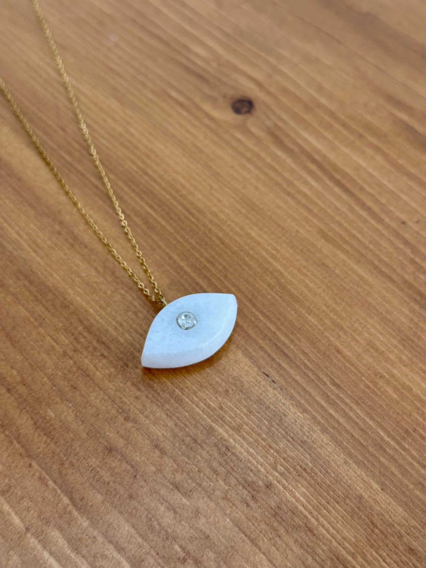 White marble eye shape with zircons