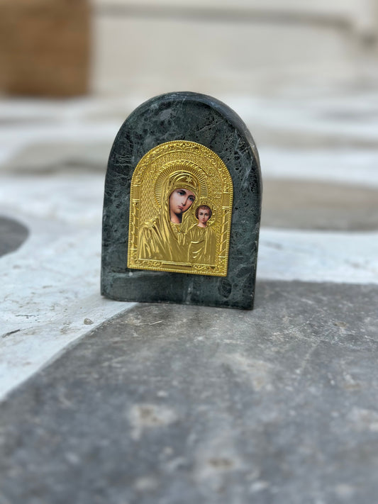 The Virgin Mary in a golden depiction on 3 cm thick green marble from Tinos