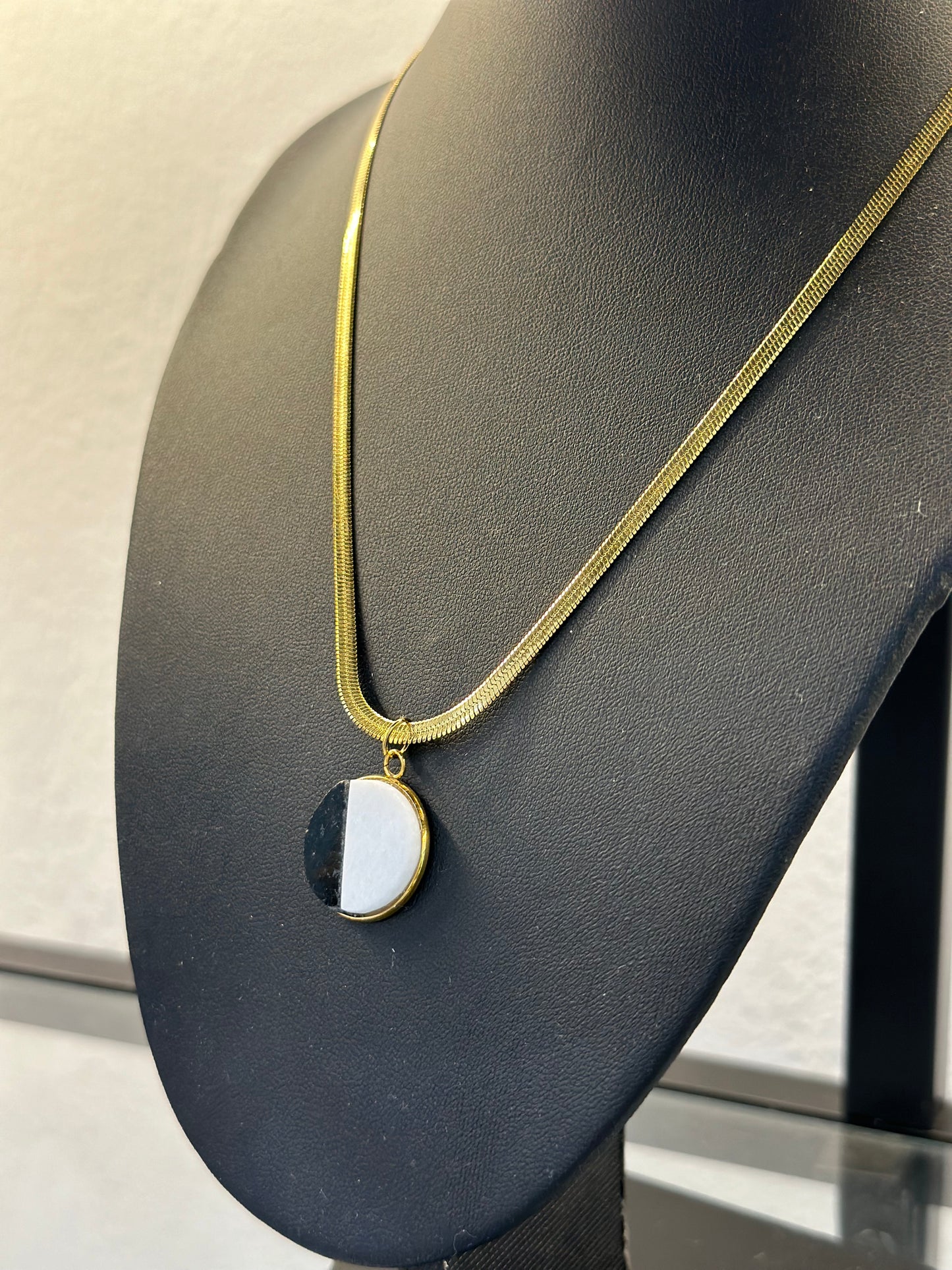 “Yin Yang” pendant with white marble and black granite on a snake chain