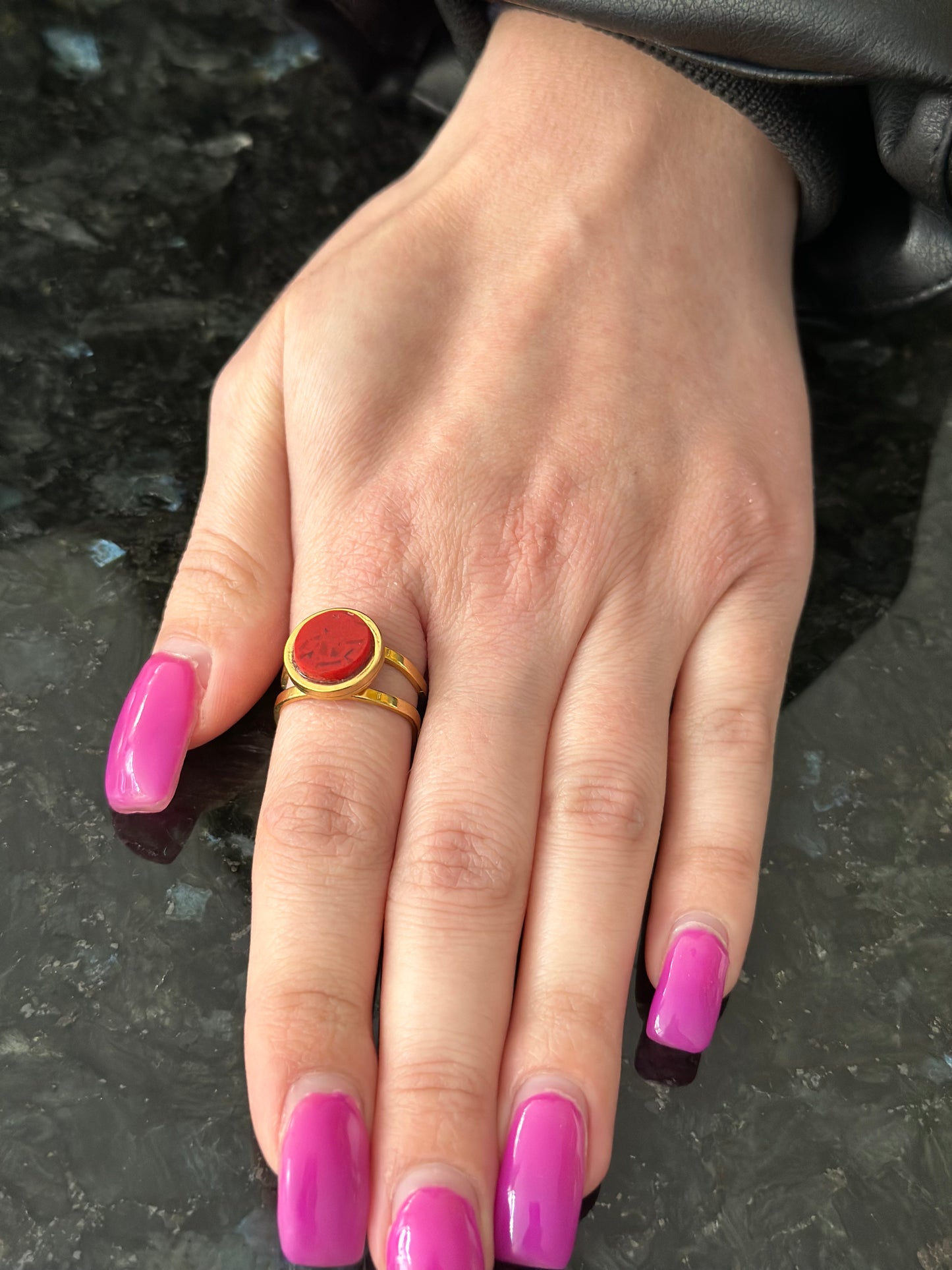 Double base ring with red granite