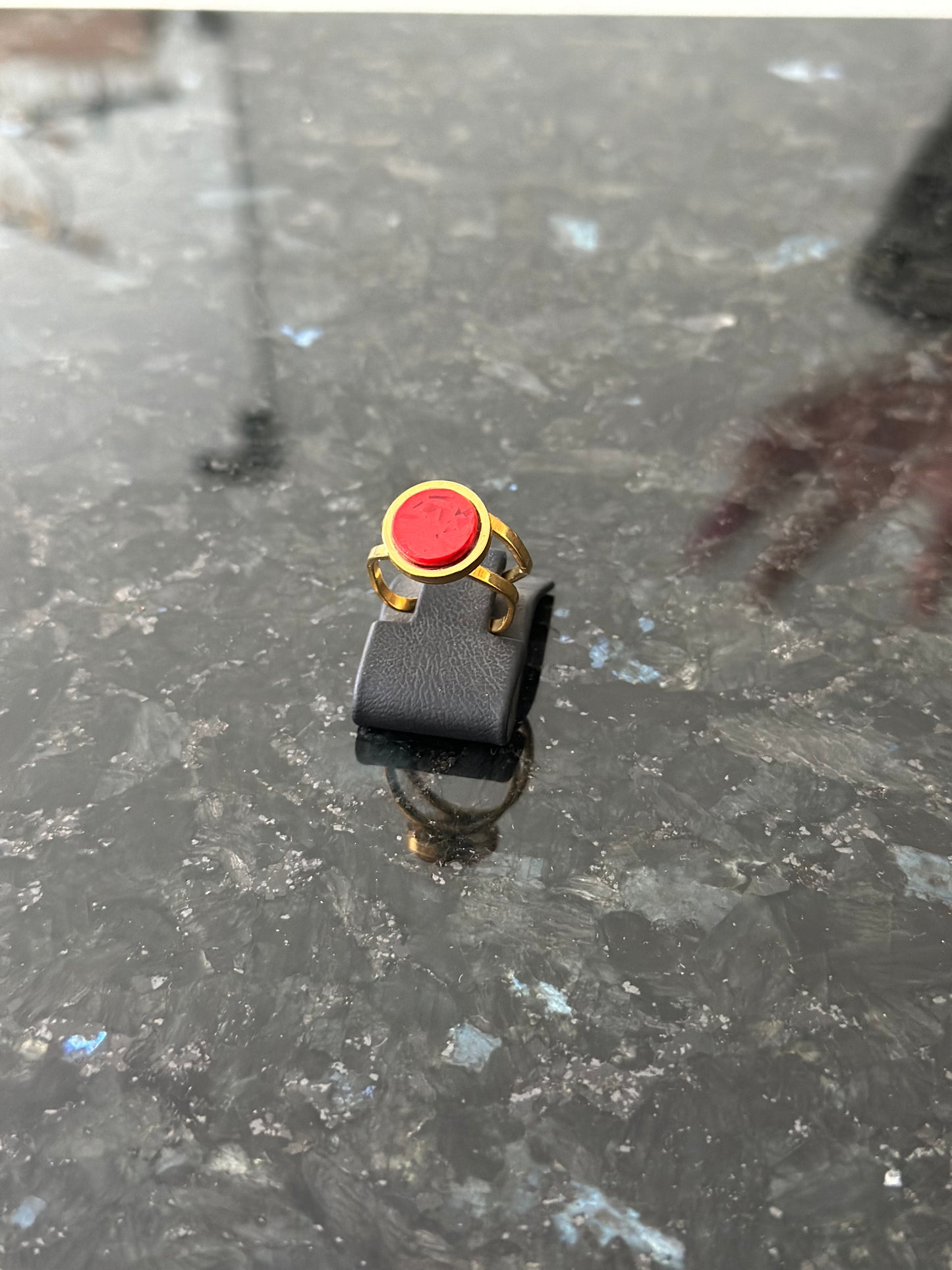 Double base ring with red granite